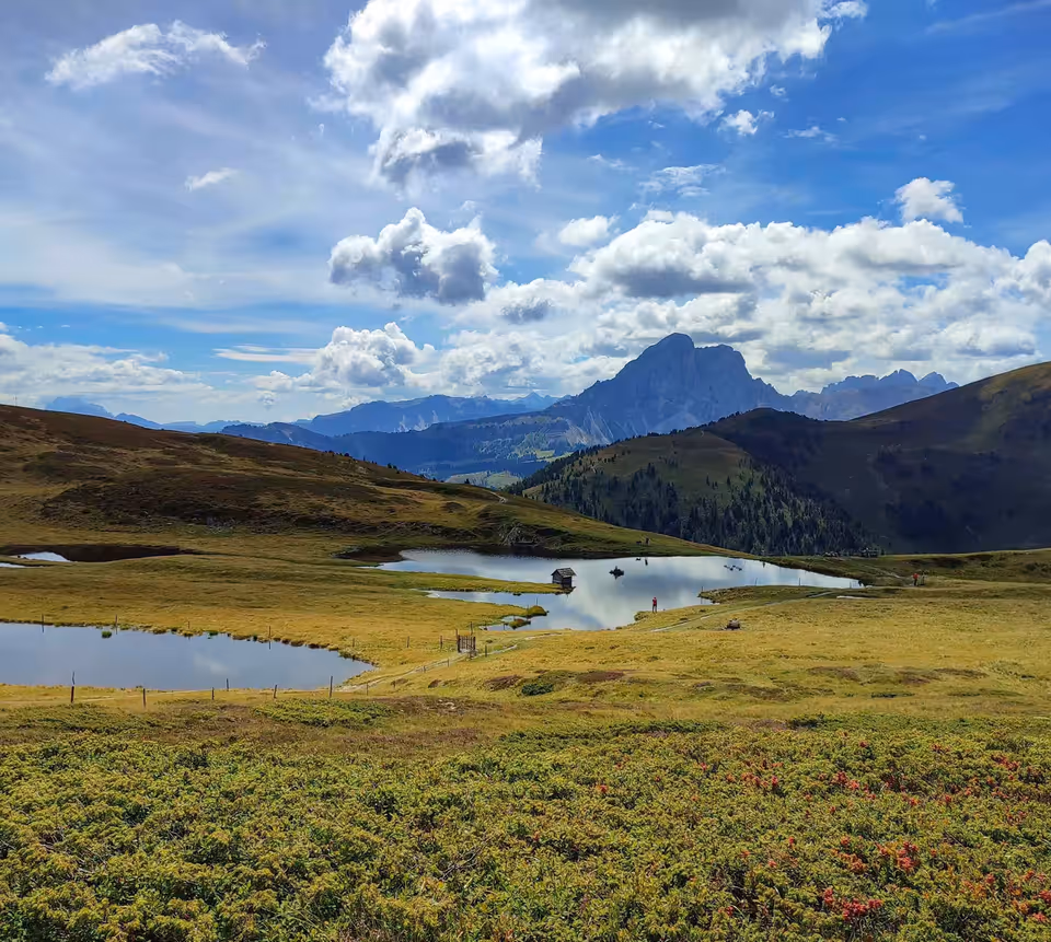 Alpine lakes and meadows on a high plateau above the Puster Valley