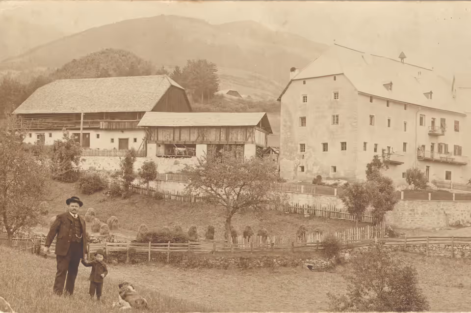 Historic photograph of the farmstead and residence